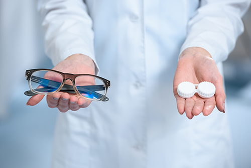 flexible spending account | photo of technician holding eyeglasses or contact lenses