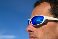 vision related new year resolutions | photo of gut wearing sports sunglasses