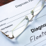 eye floaters | photo showing a prescription form reading: Diagnosis Floaters