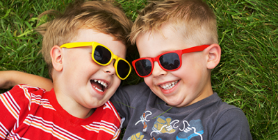 Do children really need sunglasses? | photo of 2 young boys wearing sunglasses