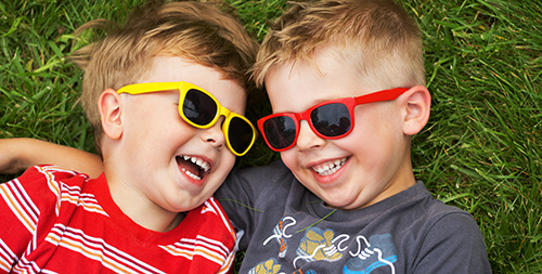 Do children really need sunglasses? | photo of 2 young boys wearing sunglasses