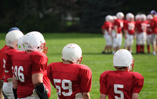 concussions | football season | photo of boy's football game