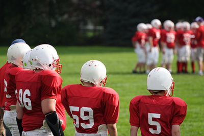 concussions | football season | photo of boy's football game